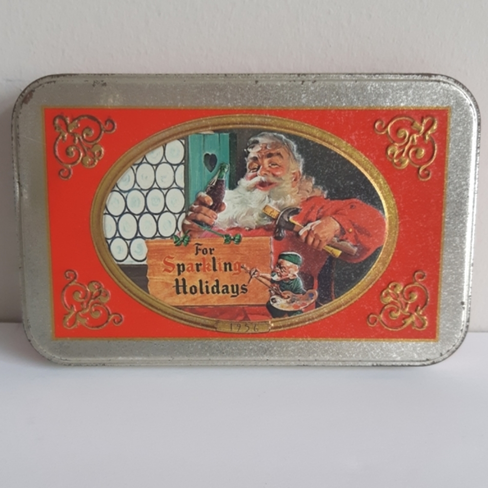 Sealed 1998 Coca-Cola playing cards in tin